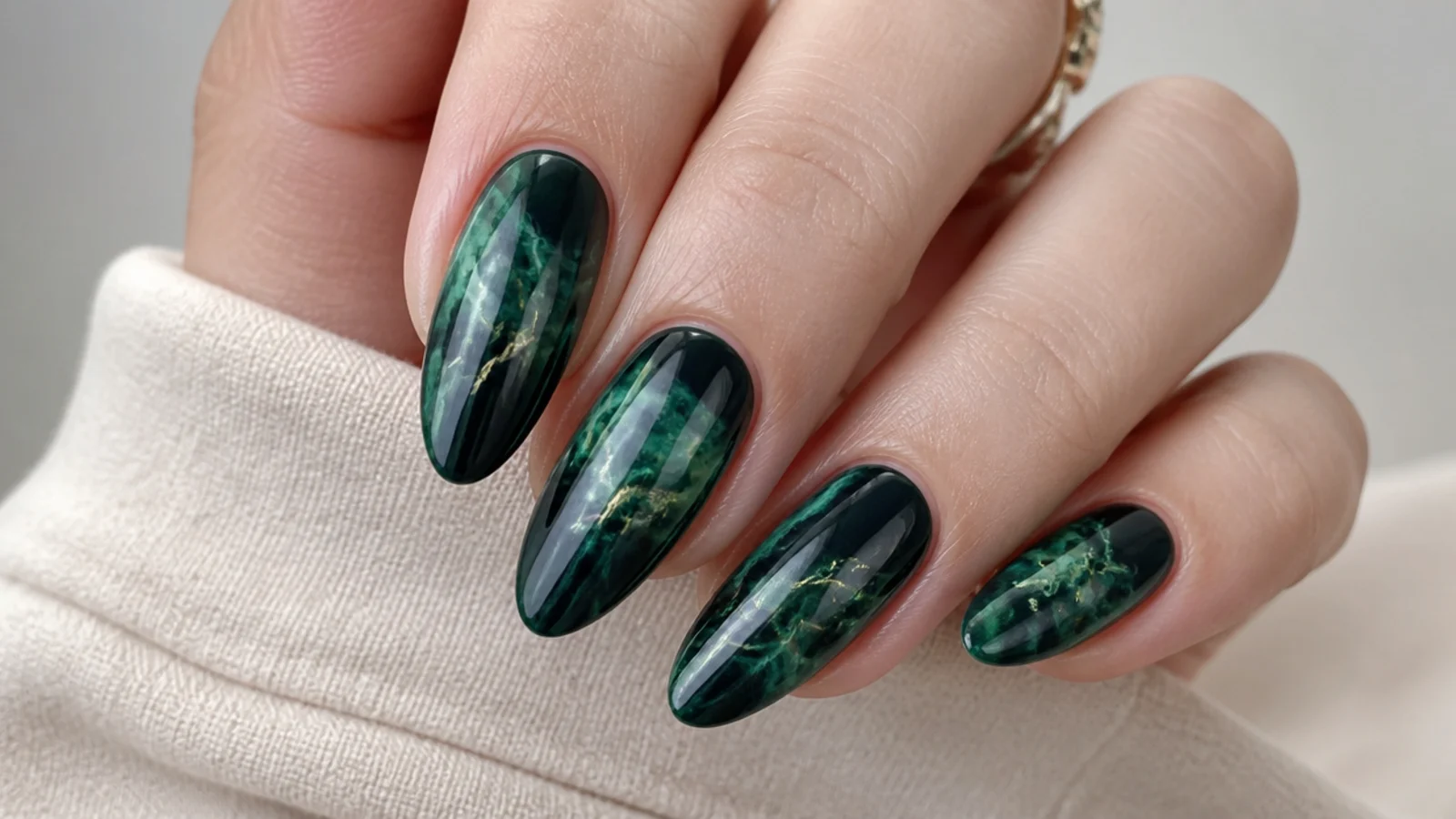 Dark green and black marble nails with smoky veining
