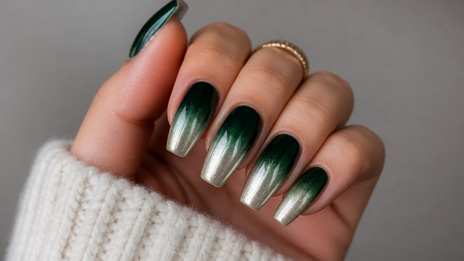 Coffin nails fading from dark emerald into silver chrome at the tips