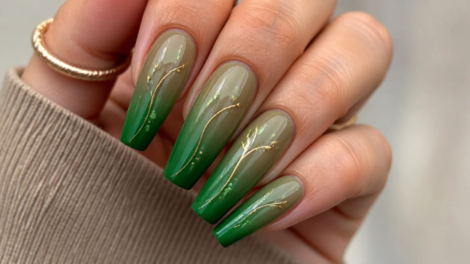Coffin nails fading from warm olive green at the cuticle into bright emerald tips