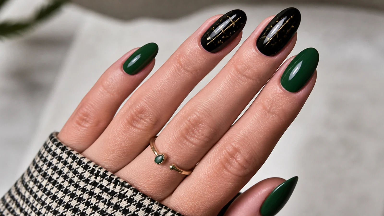 Deep forest green nails with glossy black accent nails