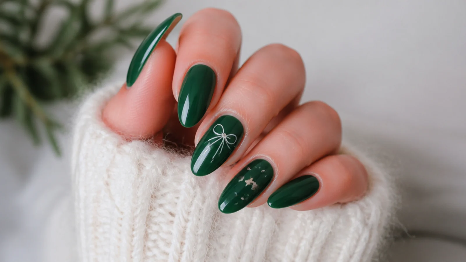 A glossy emerald green gel manicure sealed for longevity