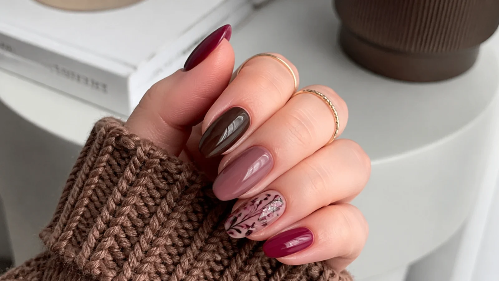 Almond nails in chocolate, mauve and cranberry cozy December shades