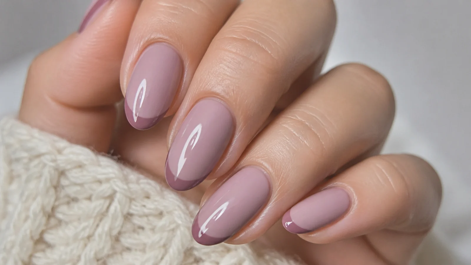 Soft milky mauve December nails with a subtle deeper mauve French tip