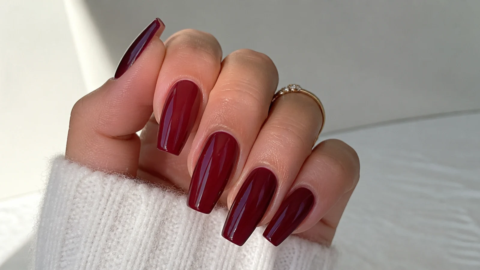 Coffin nails in deep cranberry wine with a glossy finish