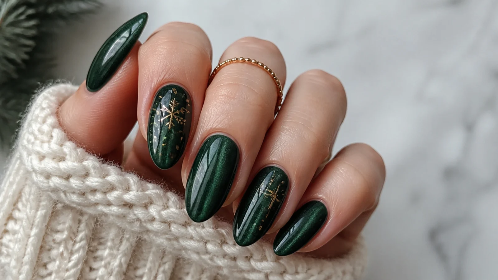 Deep forest green velvet-effect December nails with soft sheen