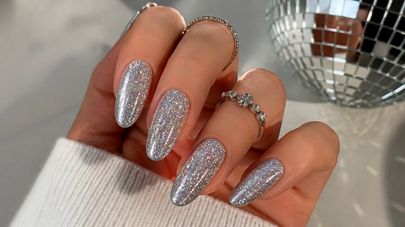 Full silver holographic glitter December nails with a disco-ball shine