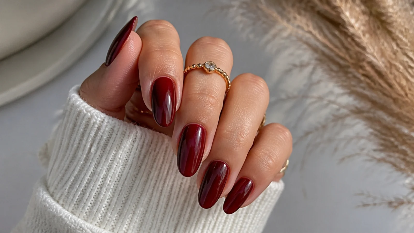 Deep cranberry jelly gel nails on almond shape