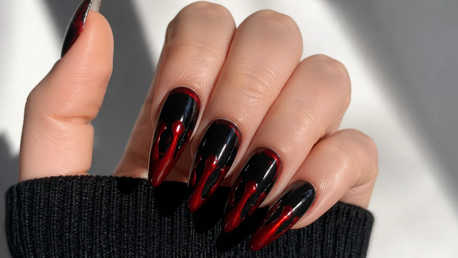 Black emo nails with glossy red blood-drip detail down the tips