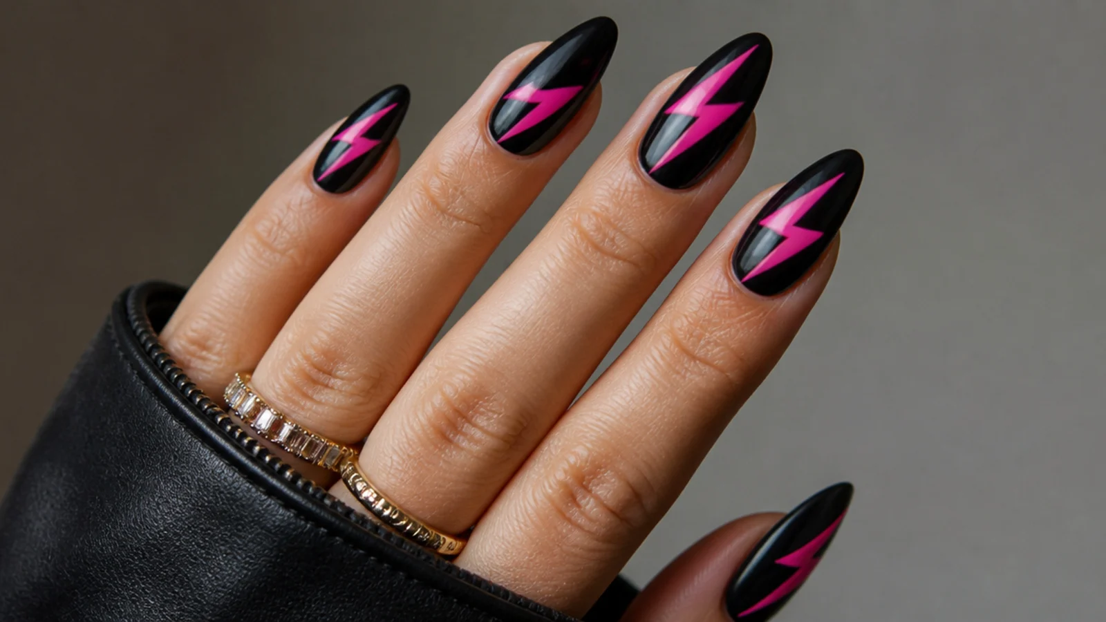 Black emo nails with hot pink lightning bolt zigzags