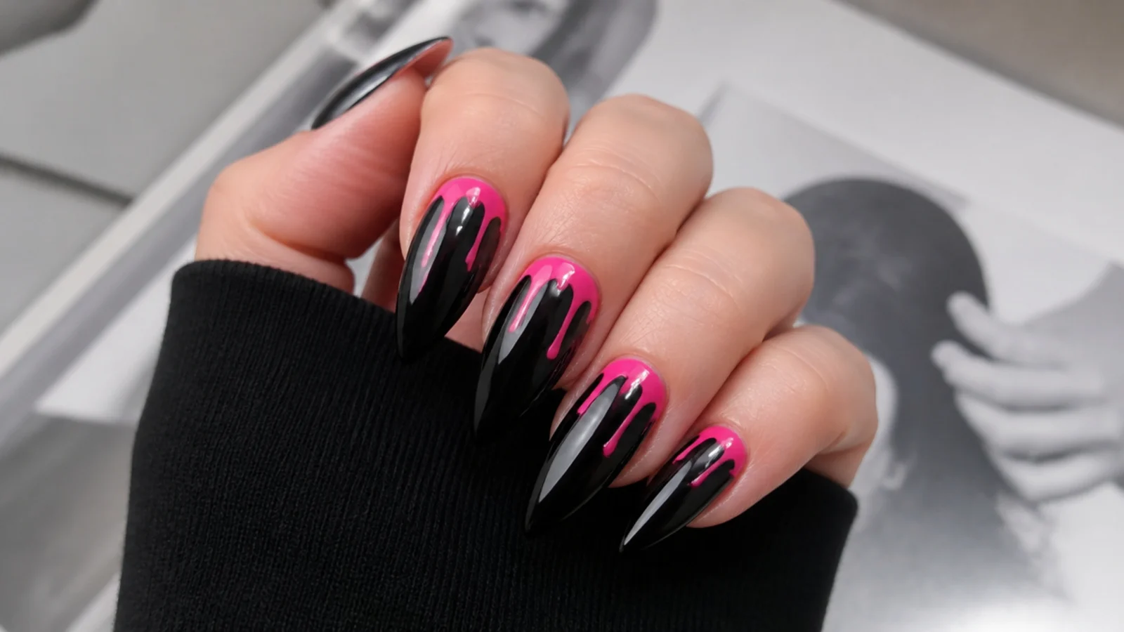 Black emo nails with hot pink slime-drip detail down from the cuticle