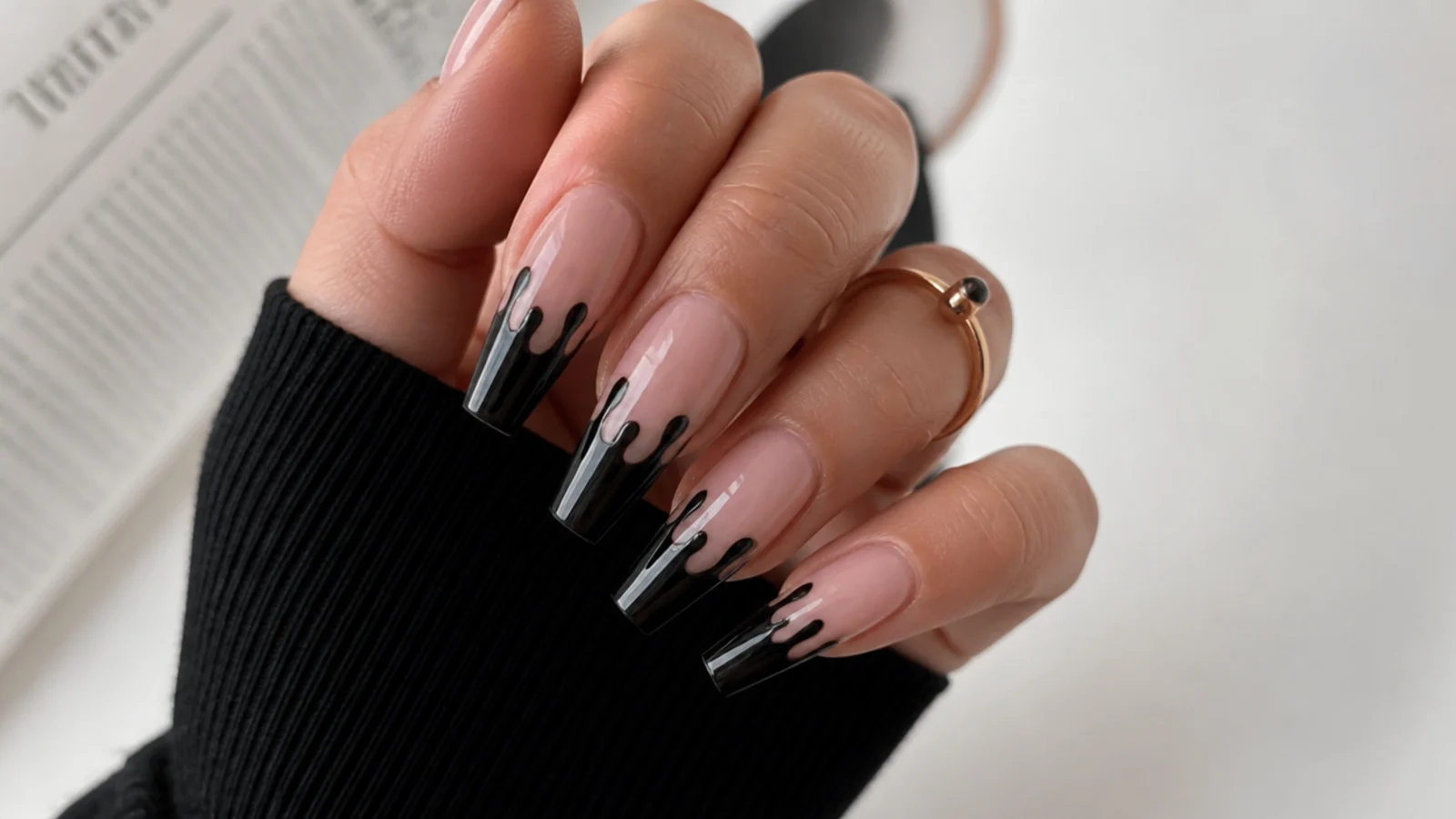 Black dripping French tip emo baddie nails on a coffin shape