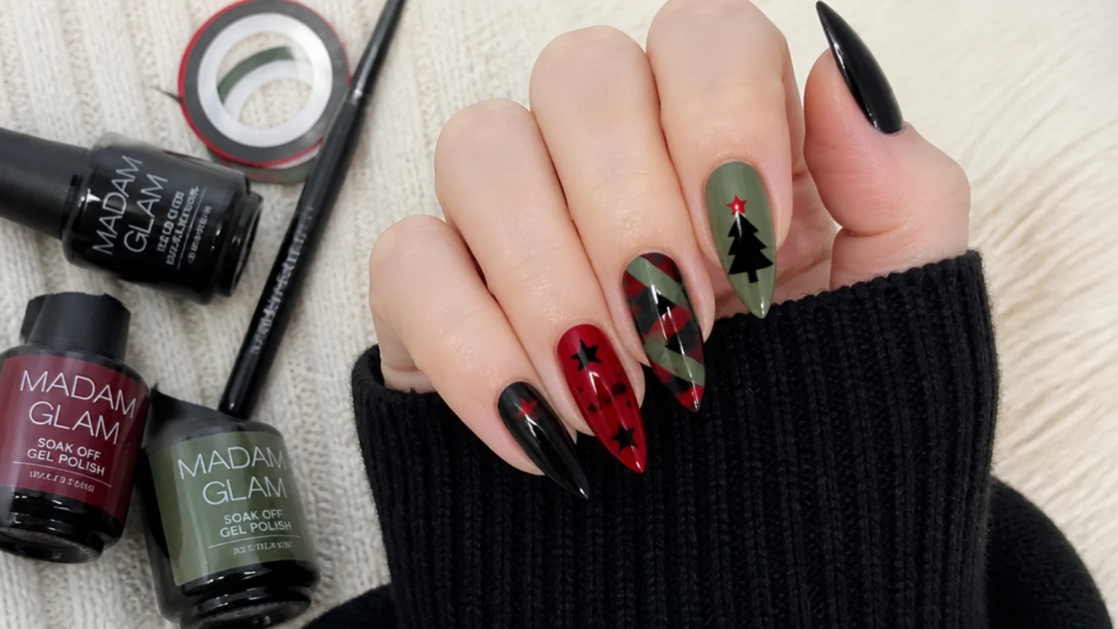 Emo Christmas nail supplies with black gel, liner brush, striping tape and red and green gels