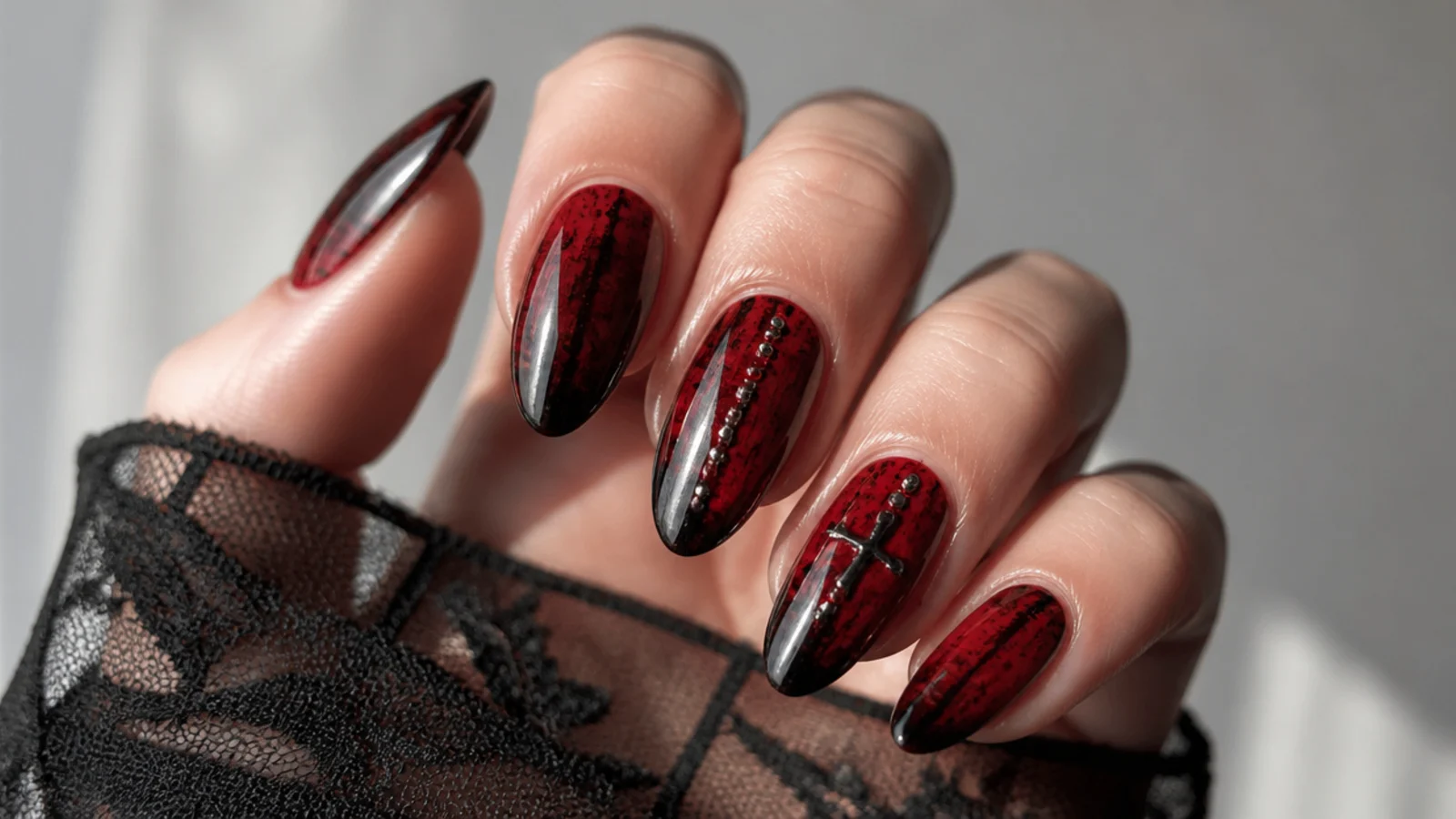 Deep red and black grunge emo nails with smudged texture