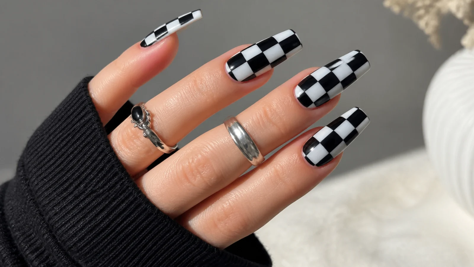 Black and white checkerboard emo nails on long coffin shape