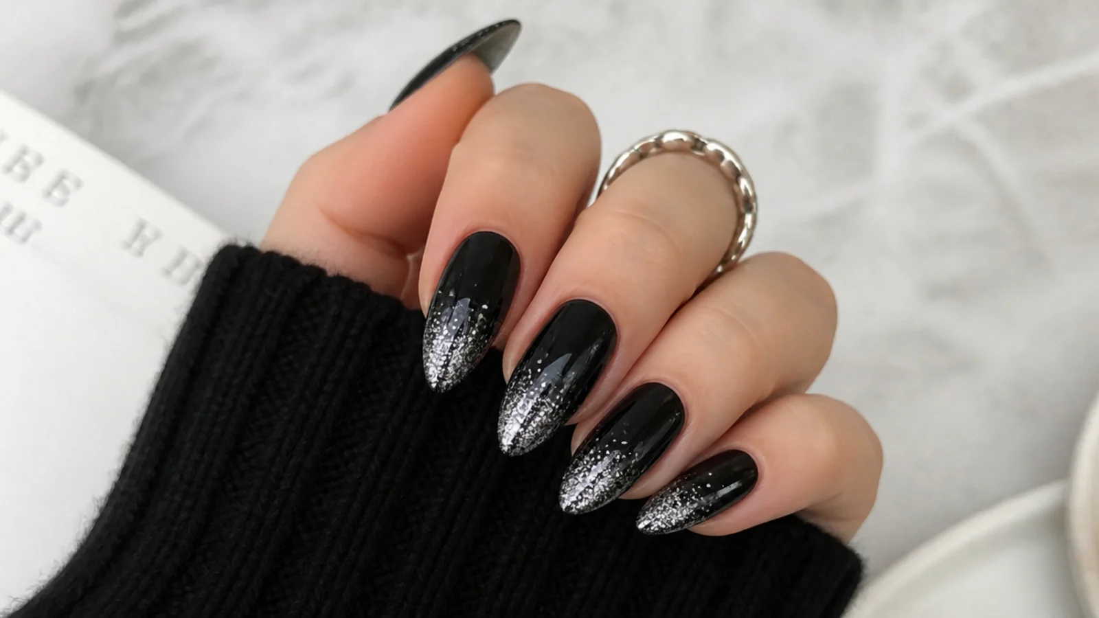 Black nails fading into silver glitter at the tips, emo Y2K style