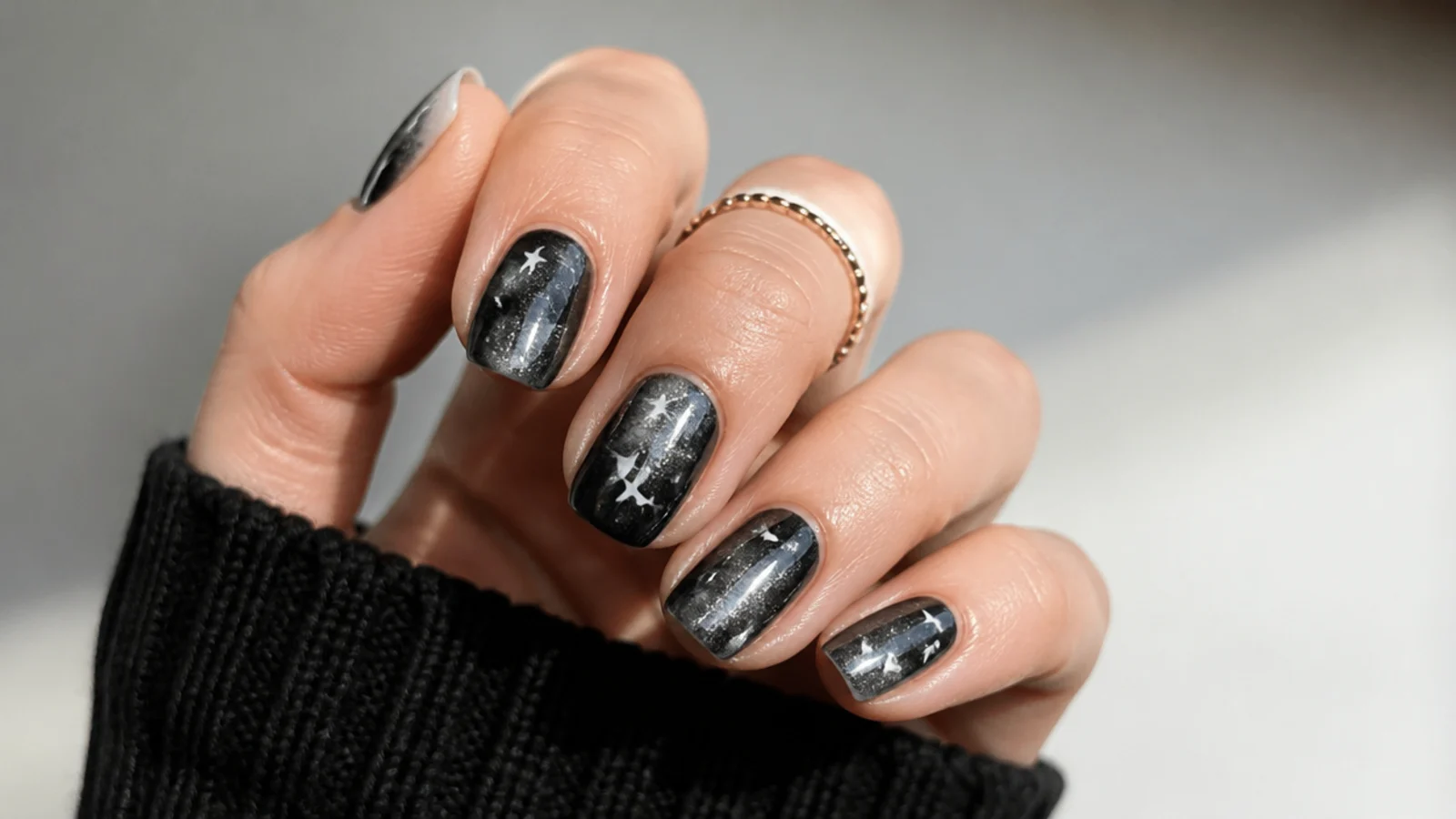 A well-sealed black emo manicure with acetone and foil for removal