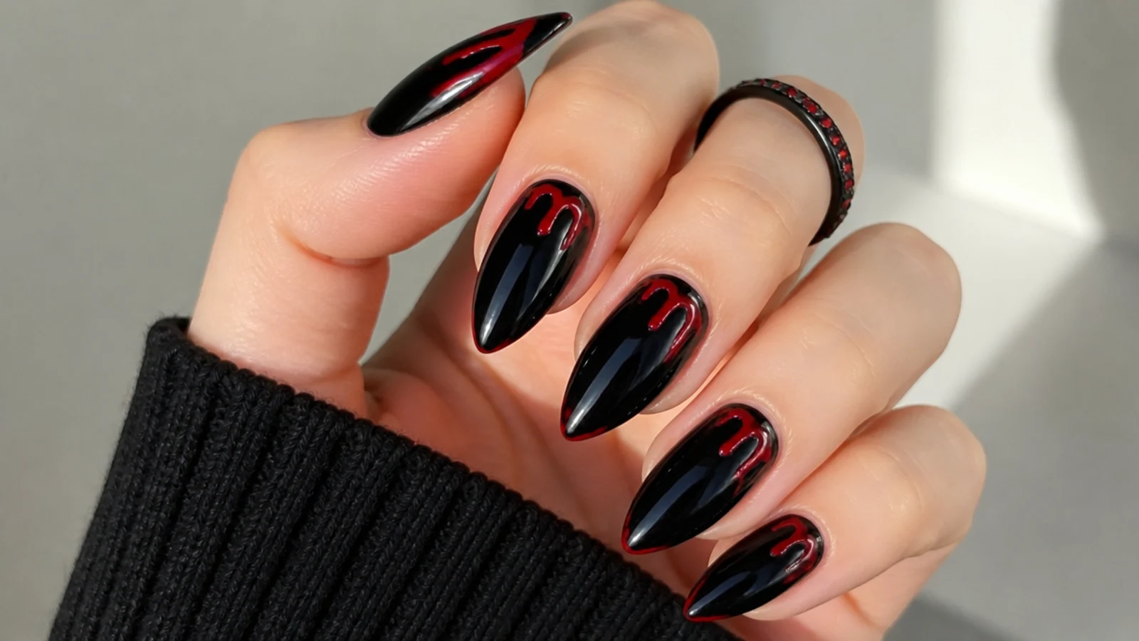 Black emo nails with red blood drips running from the tips