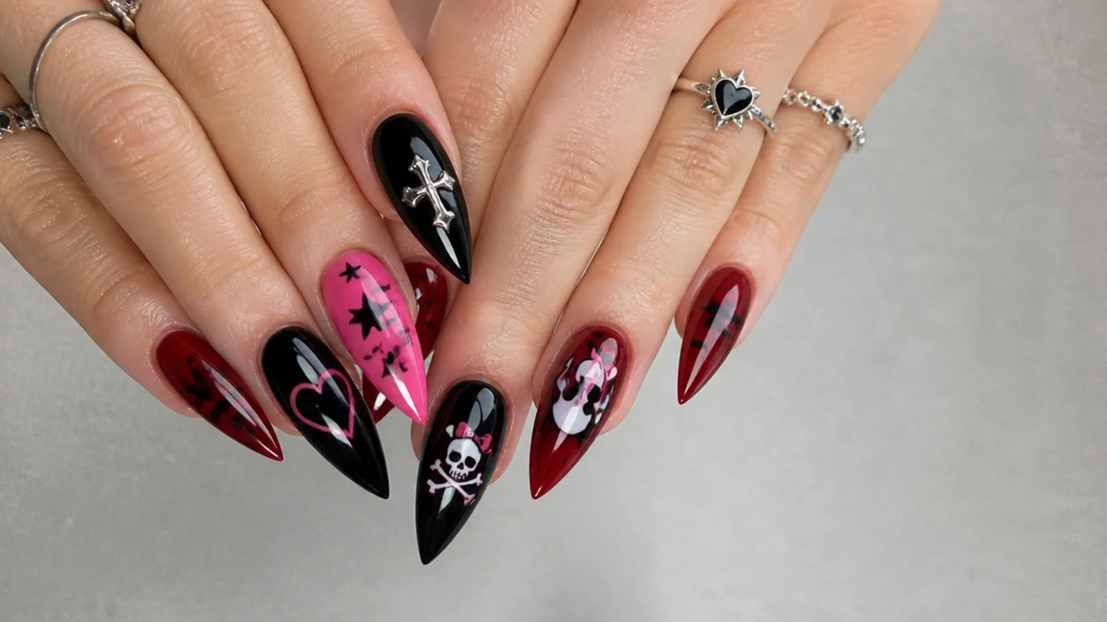 Swatches of black, hot pink and blood red with emo motif accents
