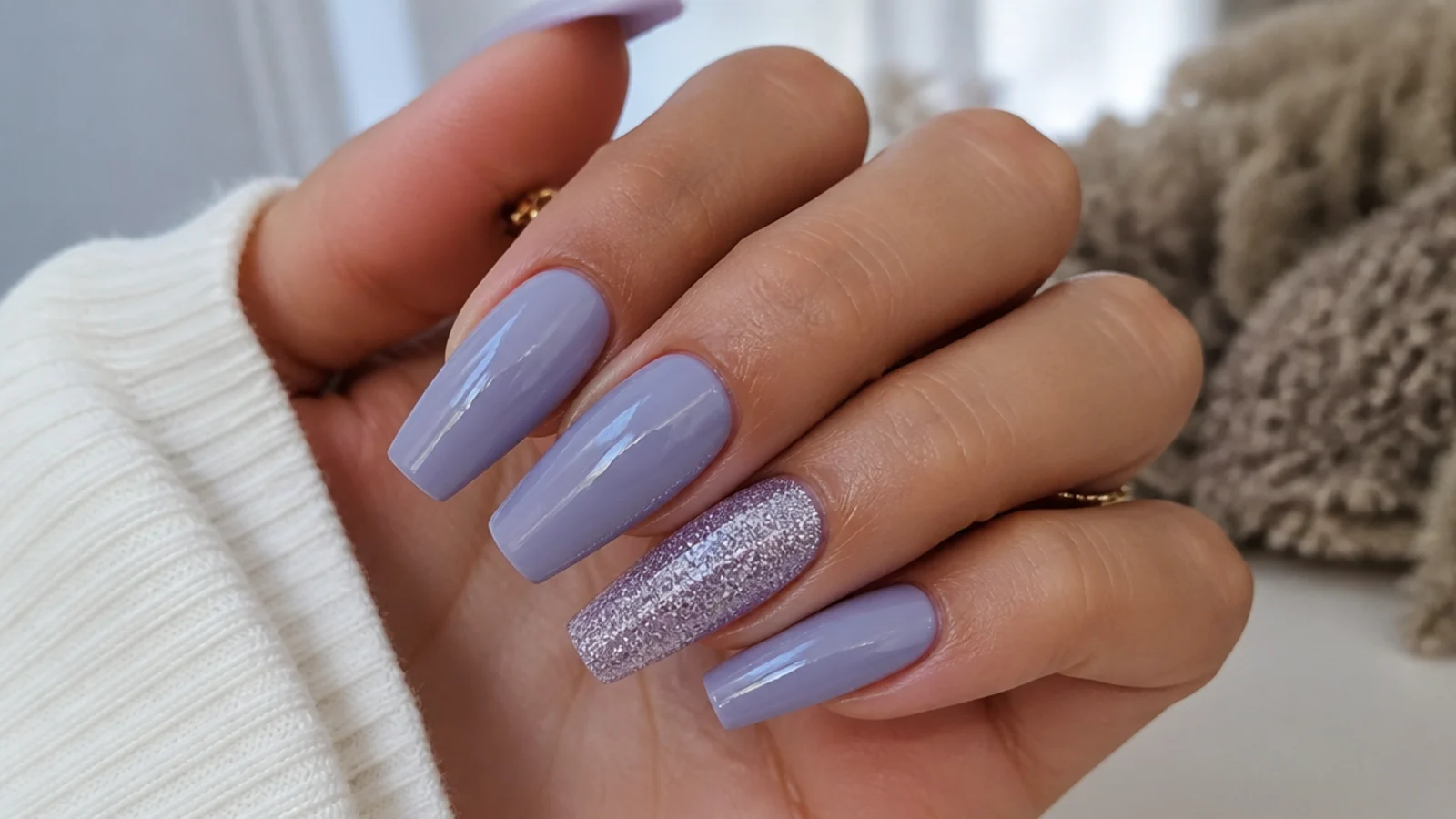 Milky lavender acrylic nails with one full glitter accent nail