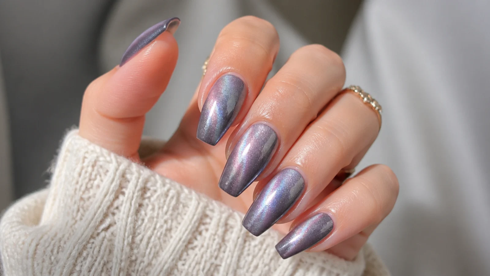 Deep lavender velvet cat-eye acrylic nails in a coffin shape