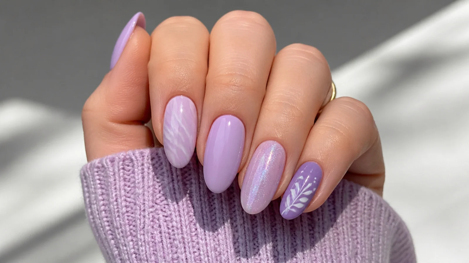 Mix-and-match lavender acrylic nails in different pastel finishes