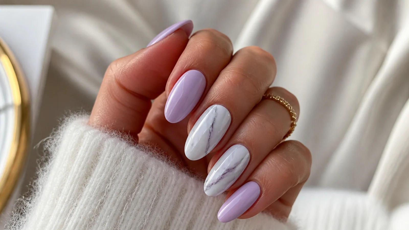 Lavender and white marble almond nails with soft gray veining