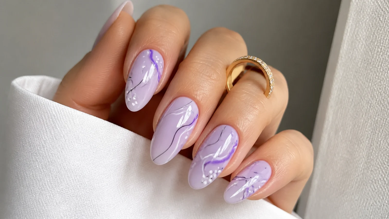 Milky lavender almond nails with fine abstract line and squiggle art