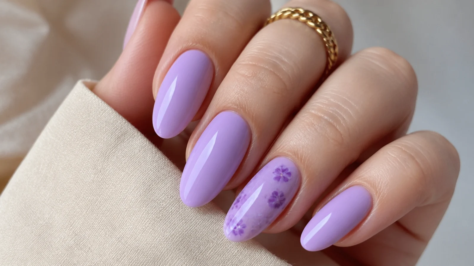 A well-sealed lavender almond manicure with cuticle oil for longevity