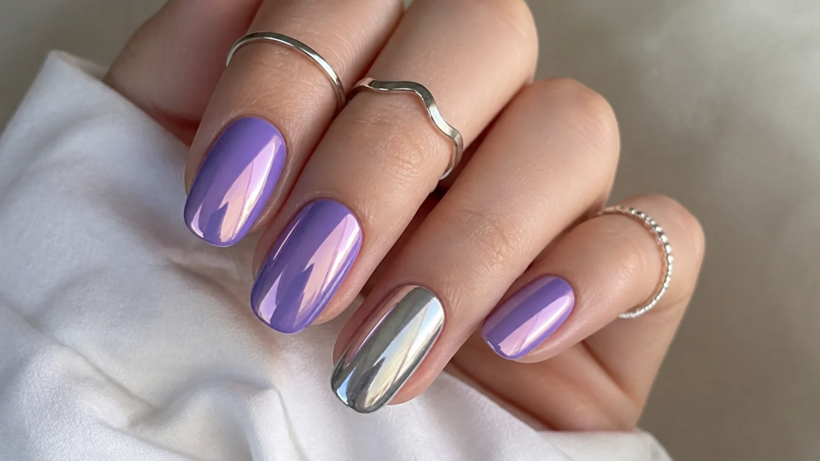 Lavender chrome nails with silver chrome accent nails