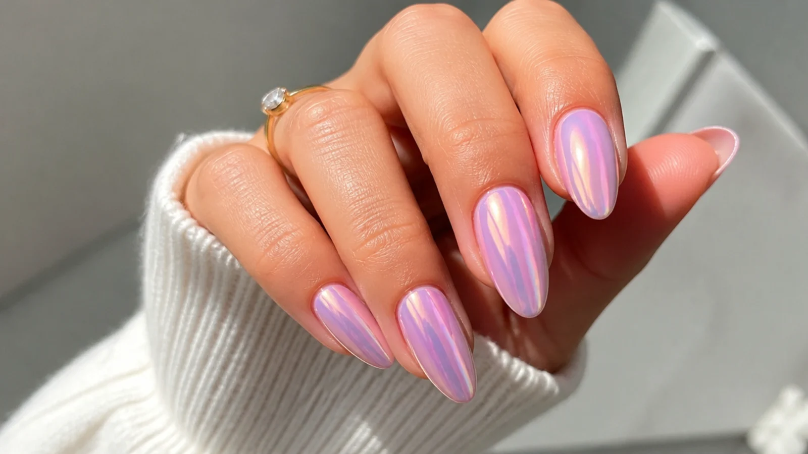 Soft pink and lavender chrome nails blended together