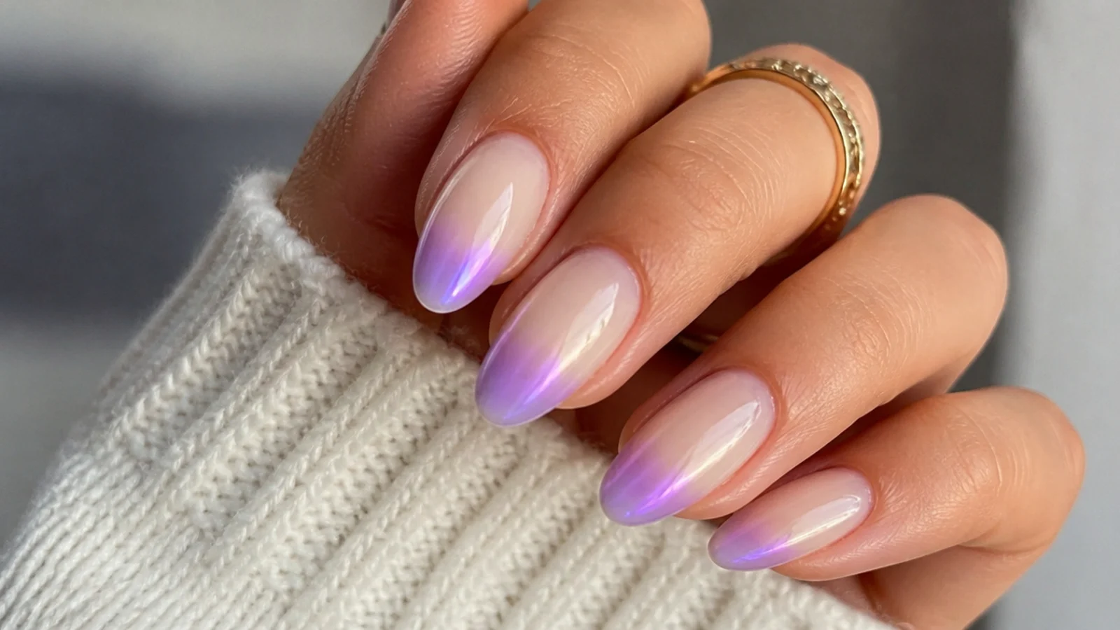 Milky nails with a lavender aura chrome glow at the tips