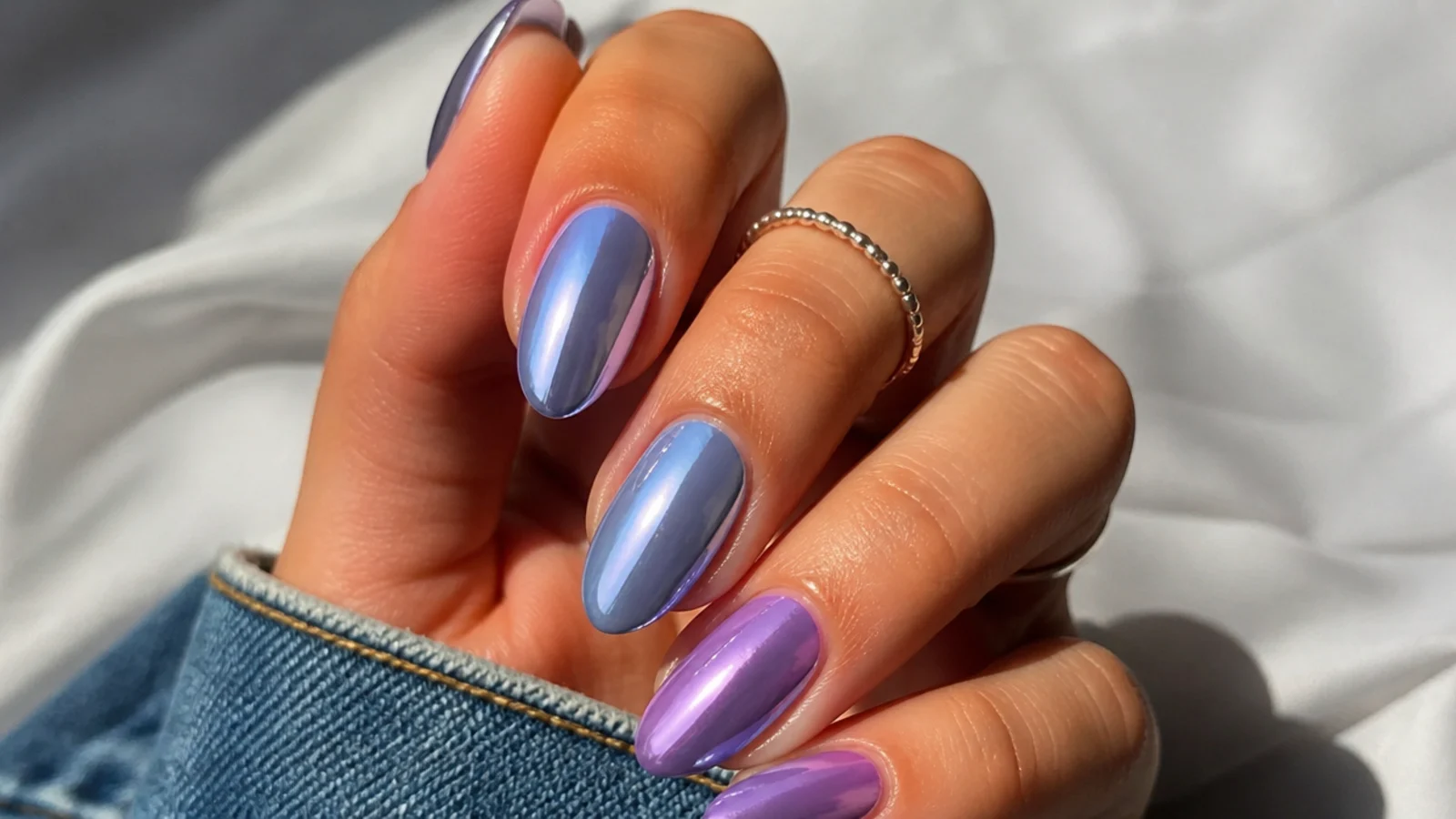 Soft gray-blue lavender chrome beside a brighter light purple chrome