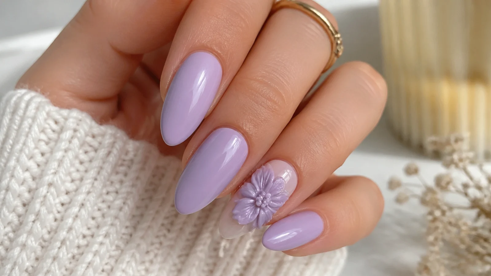 Lavender nails with a raised 3D sculpted flower on one accent nail