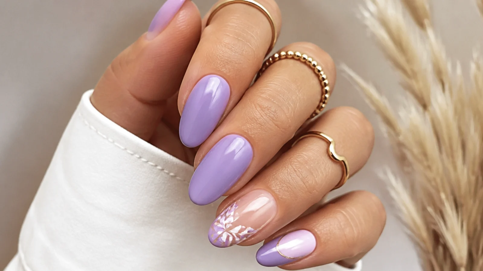 Warm pink-toned lavender nails on tan skin