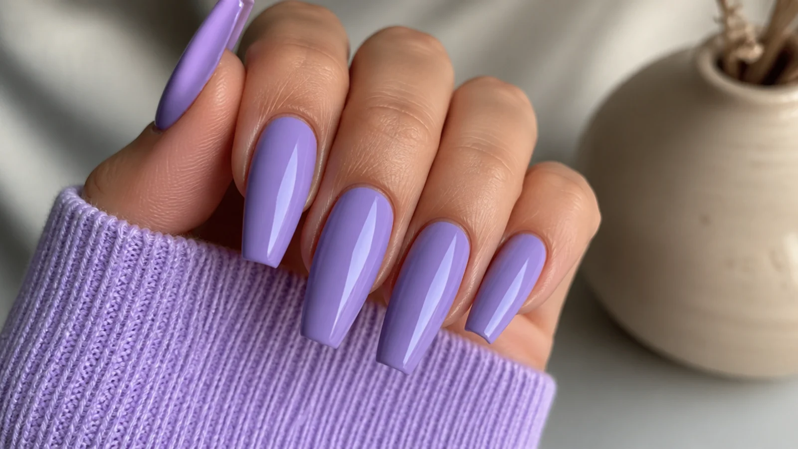 Long coffin-shaped nails in glossy solid lavender