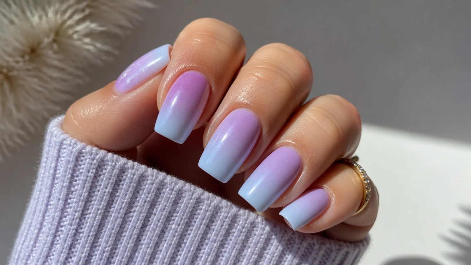 Lavender nails fading into soft baby blue ombre on square tips