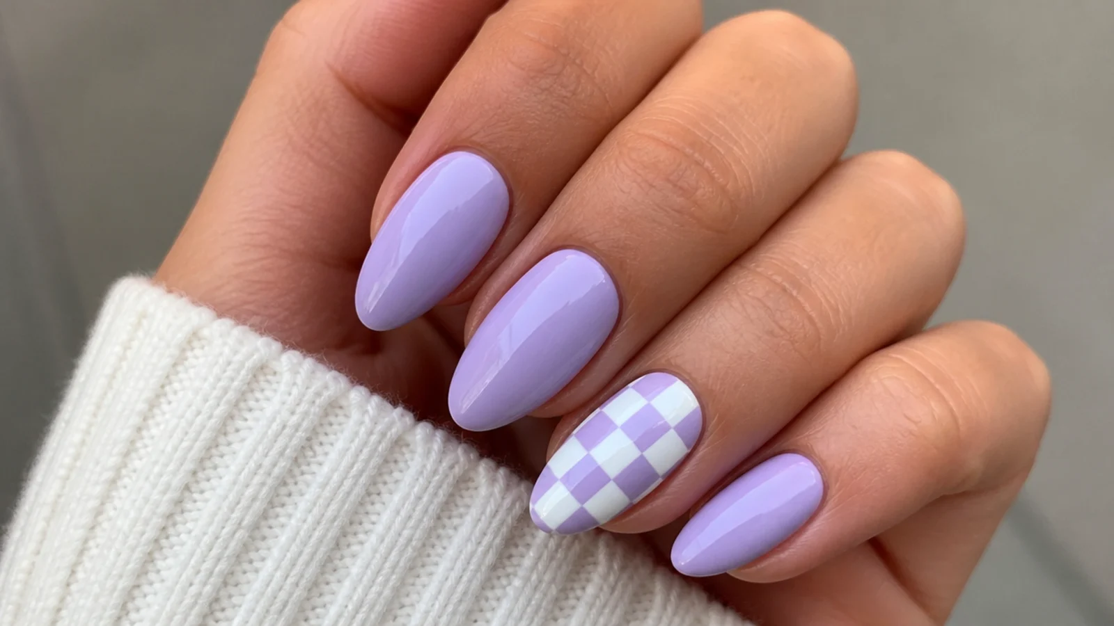 Lavender and white checkerboard accent nail with soft lavender solids