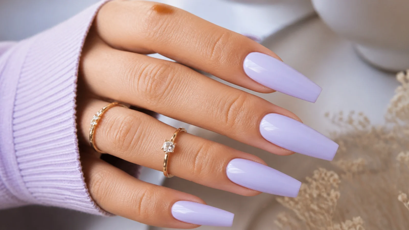 Long milky lavender coffin nails with a soft even finish
