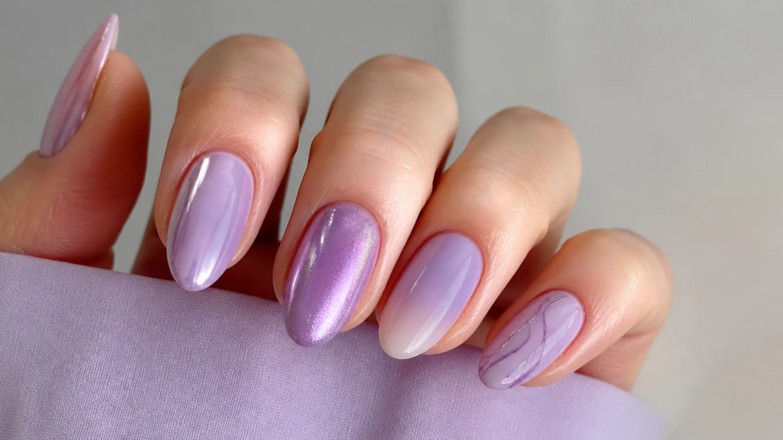 Lavender nails shown in chrome, milky, cat-eye and ombre finishes
