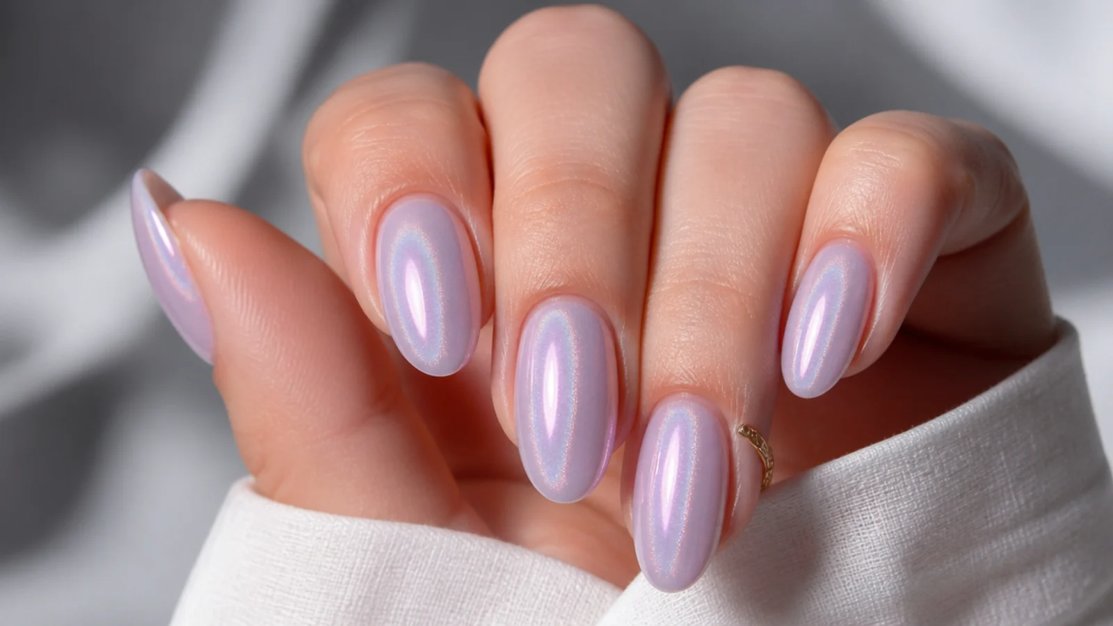 Milky lavender glazed donut nails with pearly iridescent shimmer