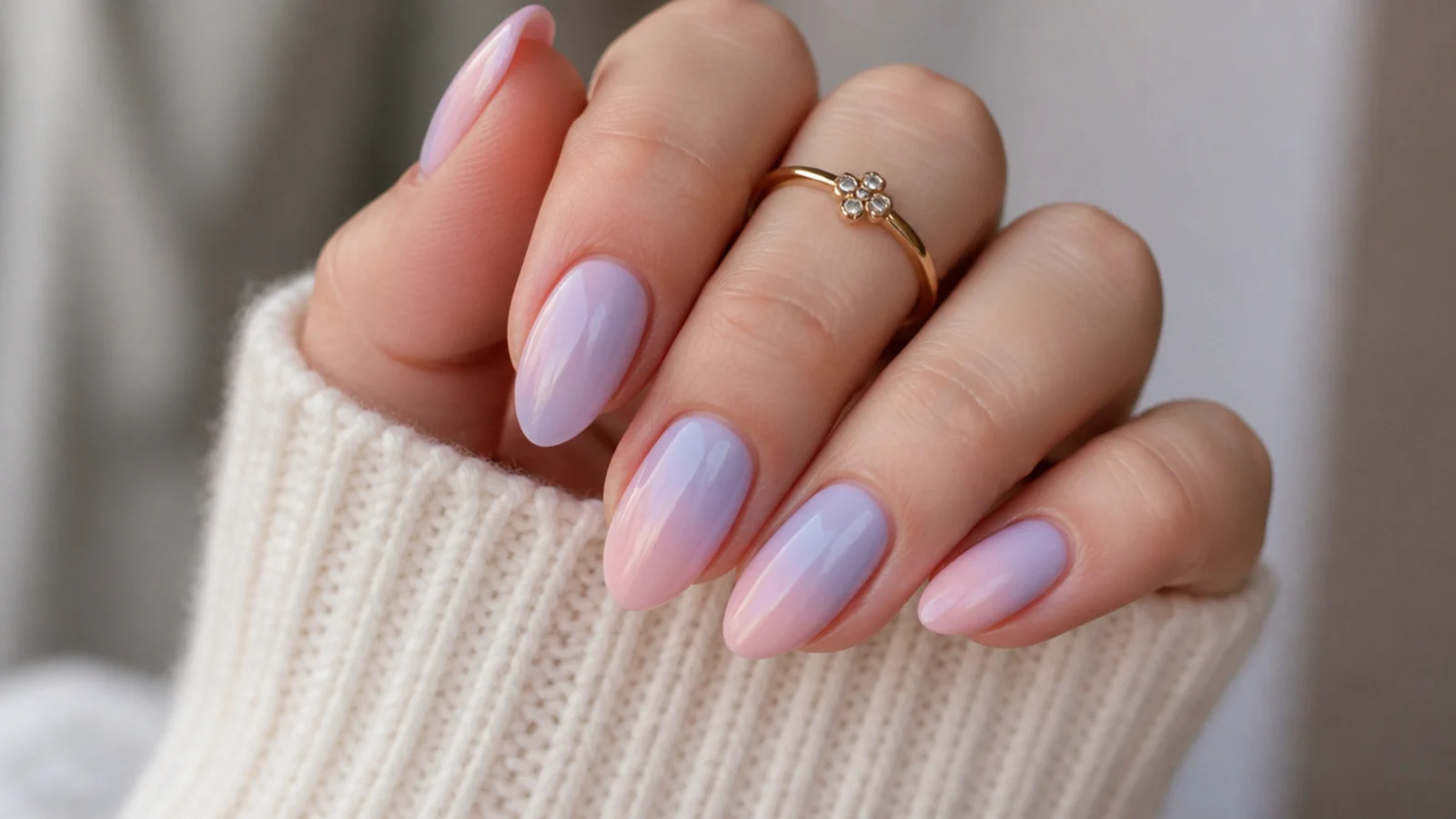 Milky lavender to soft pink ombre nails fading between two pastels