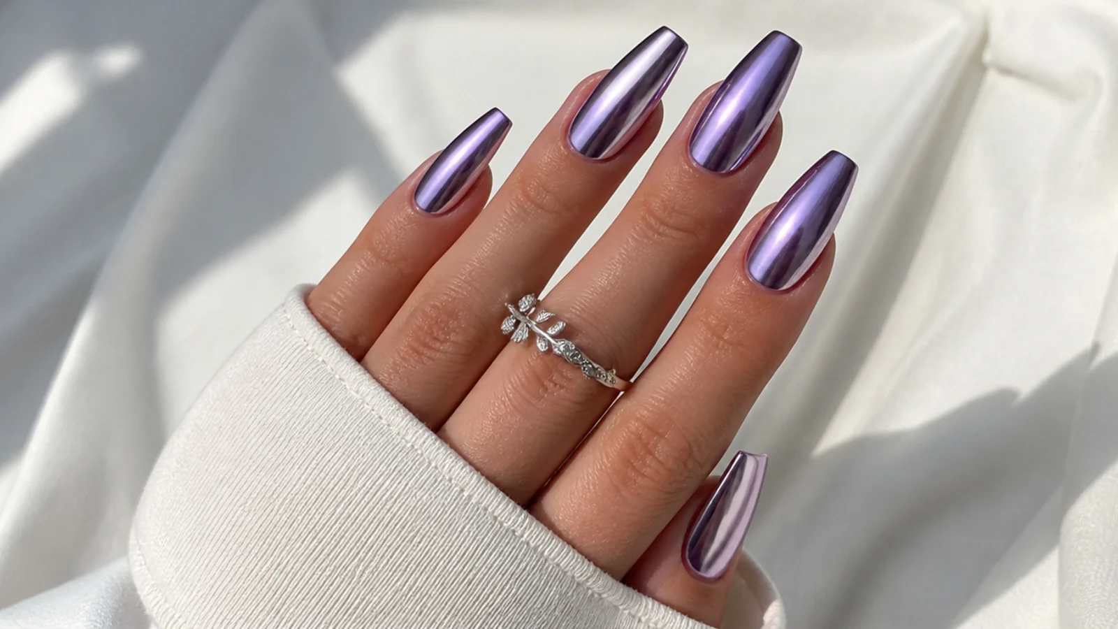Reflective lavender chrome mirror nails, coffin shape