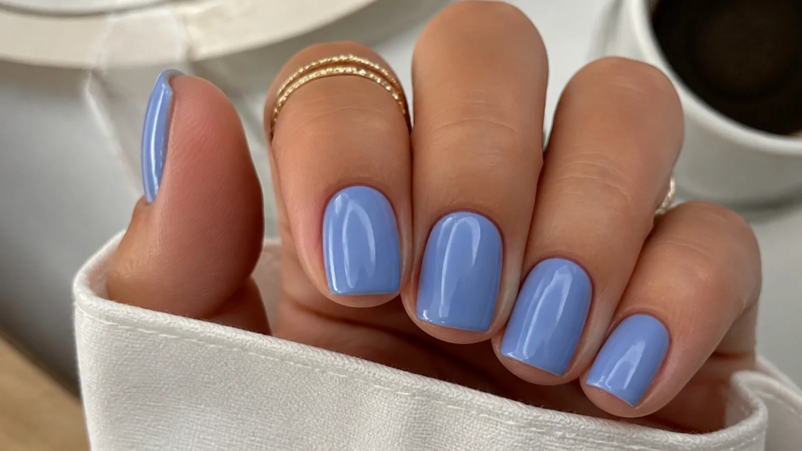 Solid periwinkle nails on a short square shape