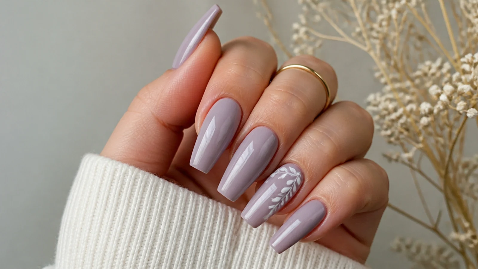 Muted grayed lavender acrylic nails on a coffin shape