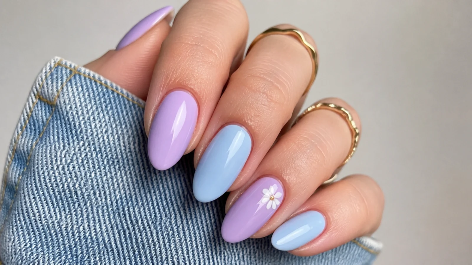 Alternating light purple and baby blue pastel acrylic nails
