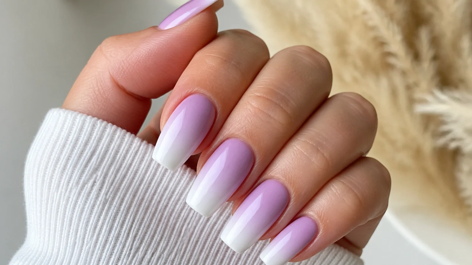 Light purple to white ombre acrylic nails, softly blended