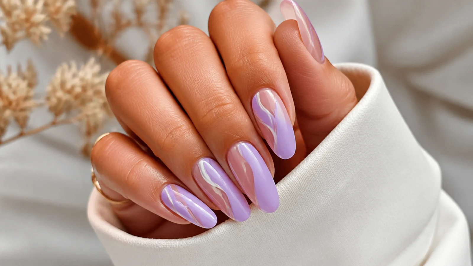 Light purple almond nails with soft lilac and white swirl line art
