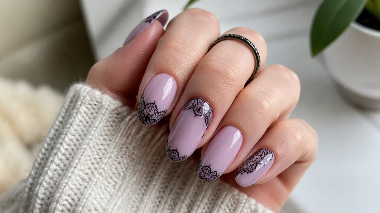 Sheer lilac nails with fine black lace-pattern line art