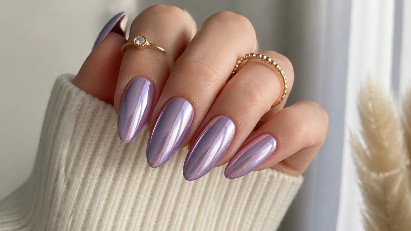 Long almond lilac chrome nails with a full liquid mirror finish