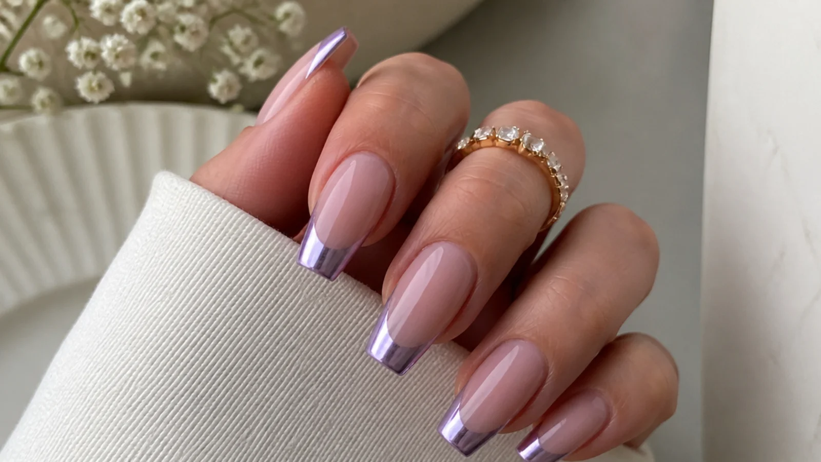 Mirror lilac chrome french tips on a nude coffin nail